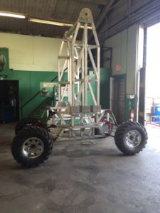 Tall rover with metallic frame and large wheels