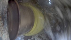 Yellow plastic wrapping around feeder